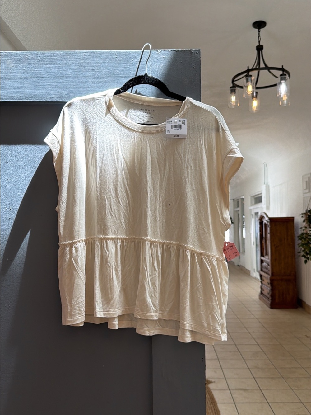 American Eagle Outfitters Cream Peplum Tee